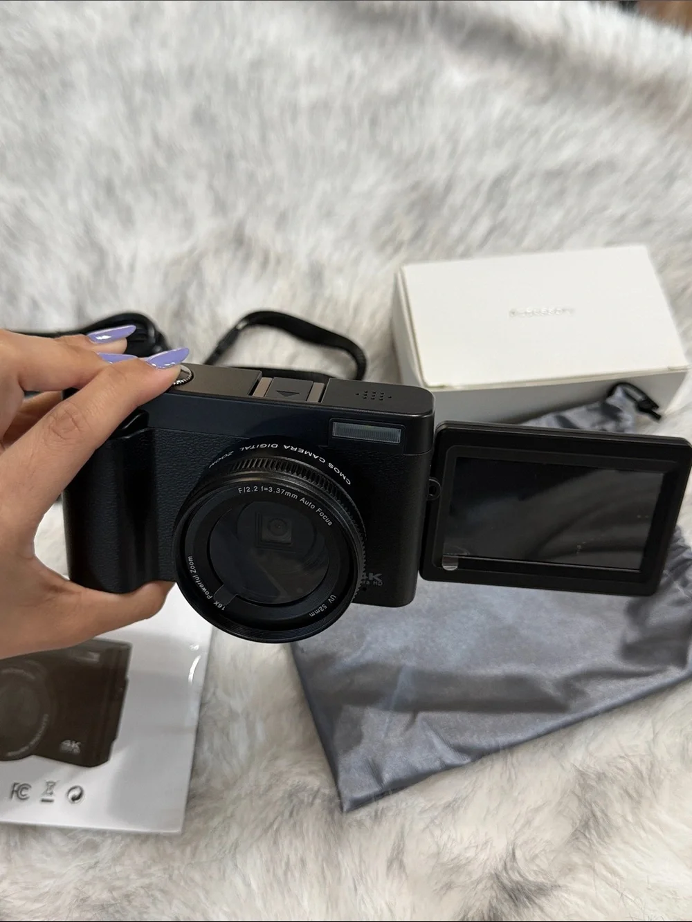 Compact Black Digital Camera with Accessories